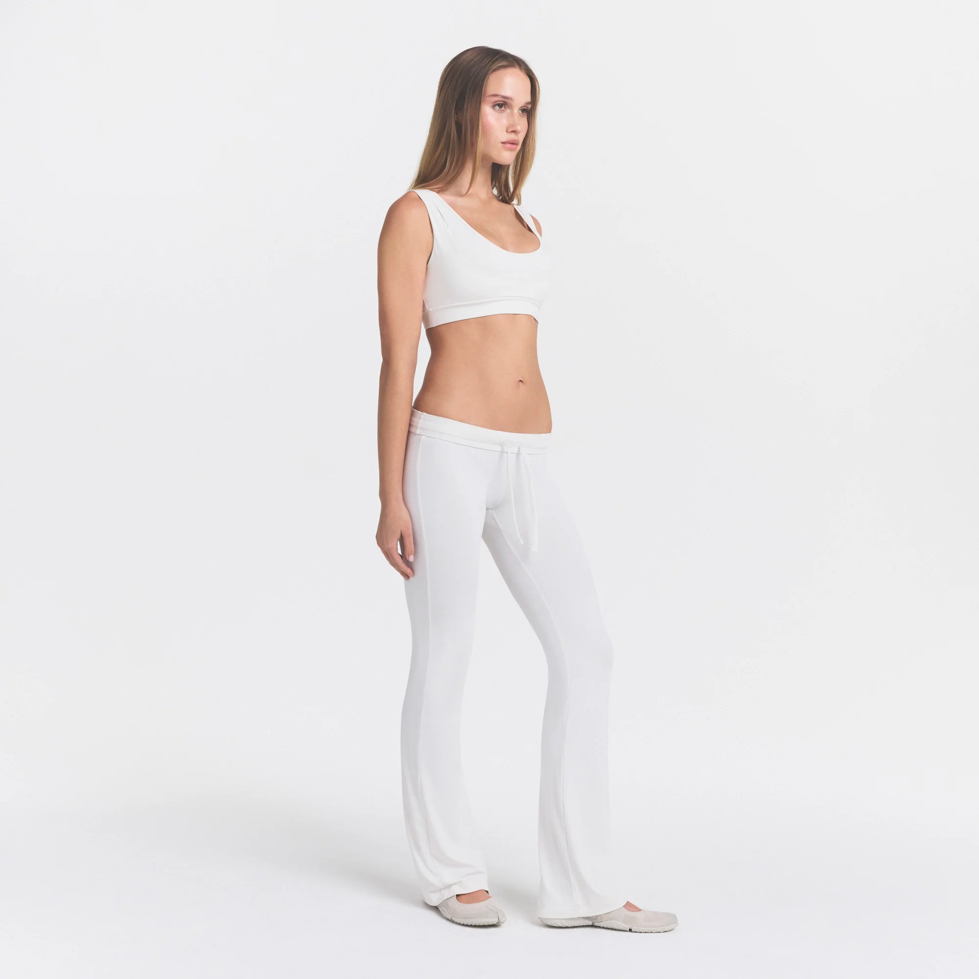 NikeSKIMS AIRY DRI-FIT™ LOW RISE MINI FLARE PANT | IVORY - Image 3