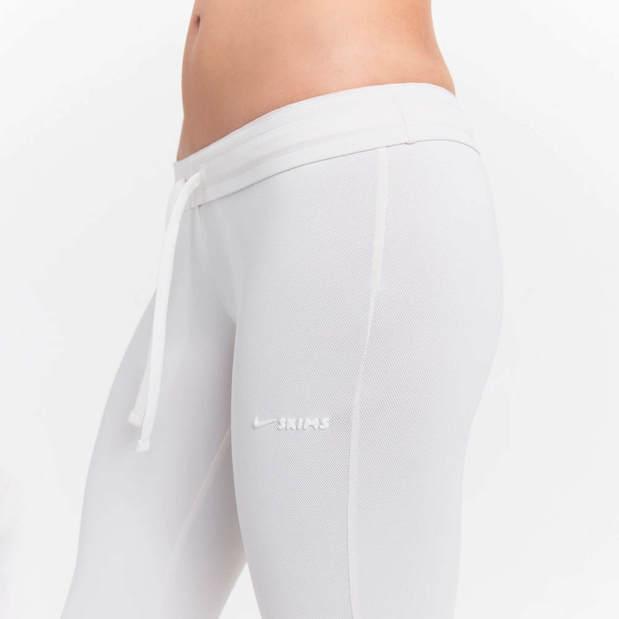 NikeSKIMS AIRY DRI-FIT™ LOW RISE MINI FLARE PANT | IVORY - Image 4