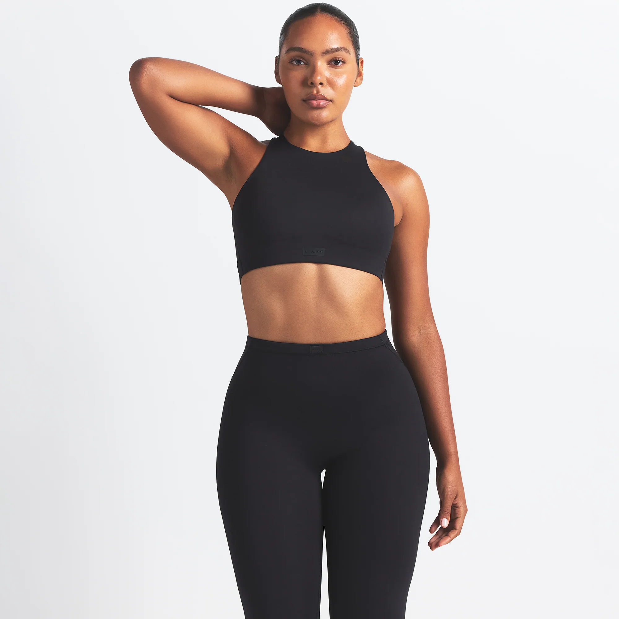 NikeSKIMS MATTE FOOTSIE GRIP LEGGING | OBSIDIAN - Image 3