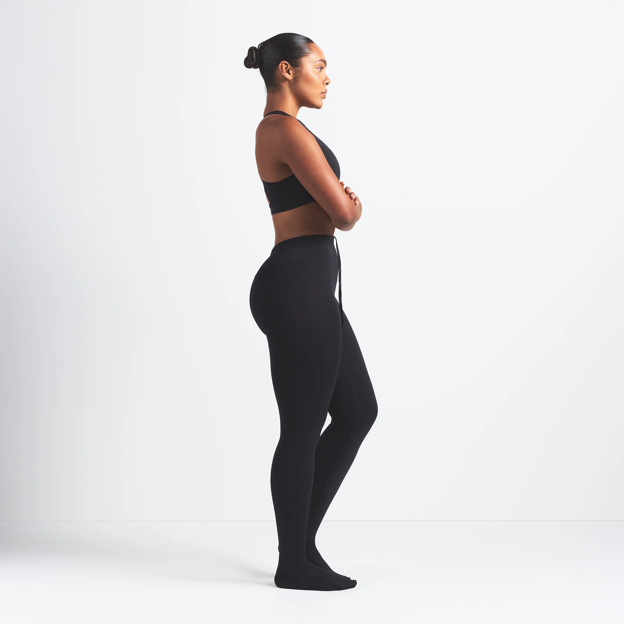 NikeSKIMS MATTE FOOTSIE GRIP LEGGING | OBSIDIAN - Image 4