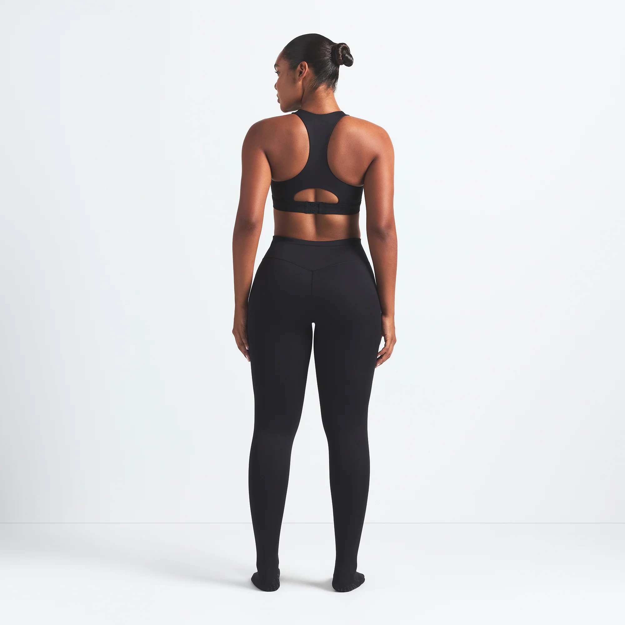 NikeSKIMS MATTE FOOTSIE GRIP LEGGING | OBSIDIAN - Image 6
