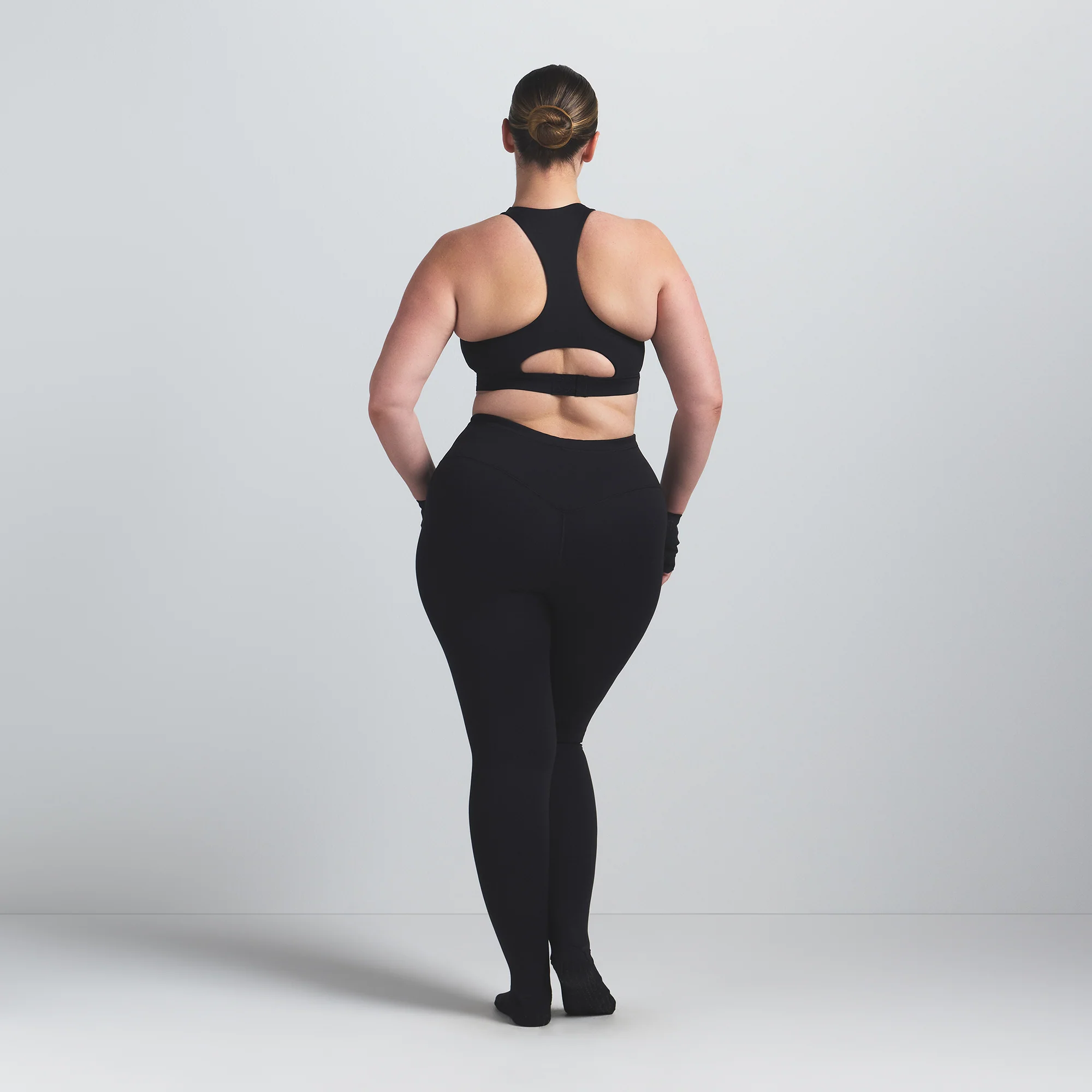 NikeSKIMS MATTE FOOTSIE GRIP LEGGING | OBSIDIAN - Image 9
