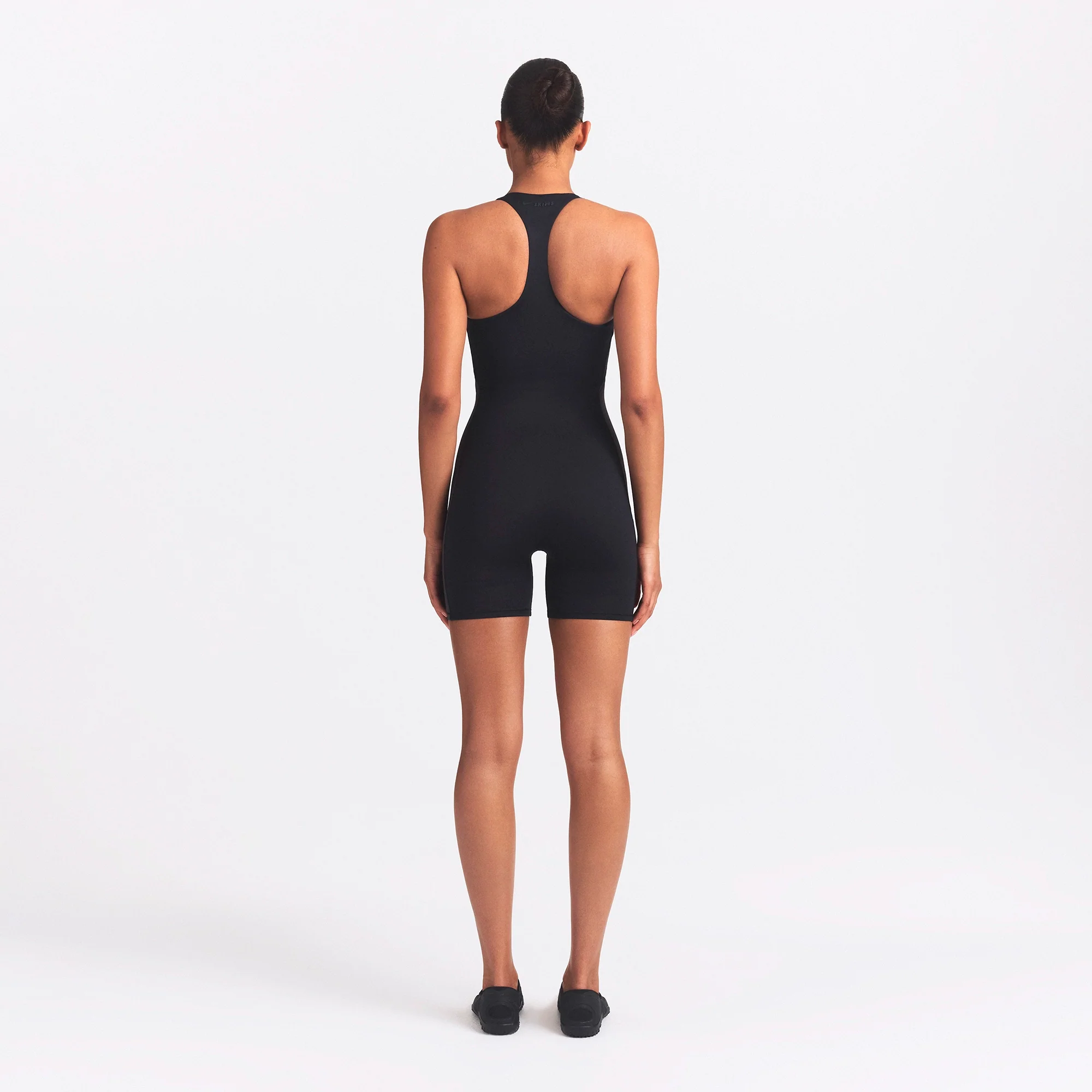 NikeSKIMS MATTE SHINE MIX RACERBACK 5" ONE PIECE | OBSIDIAN AND IGNEOUS - Image 6