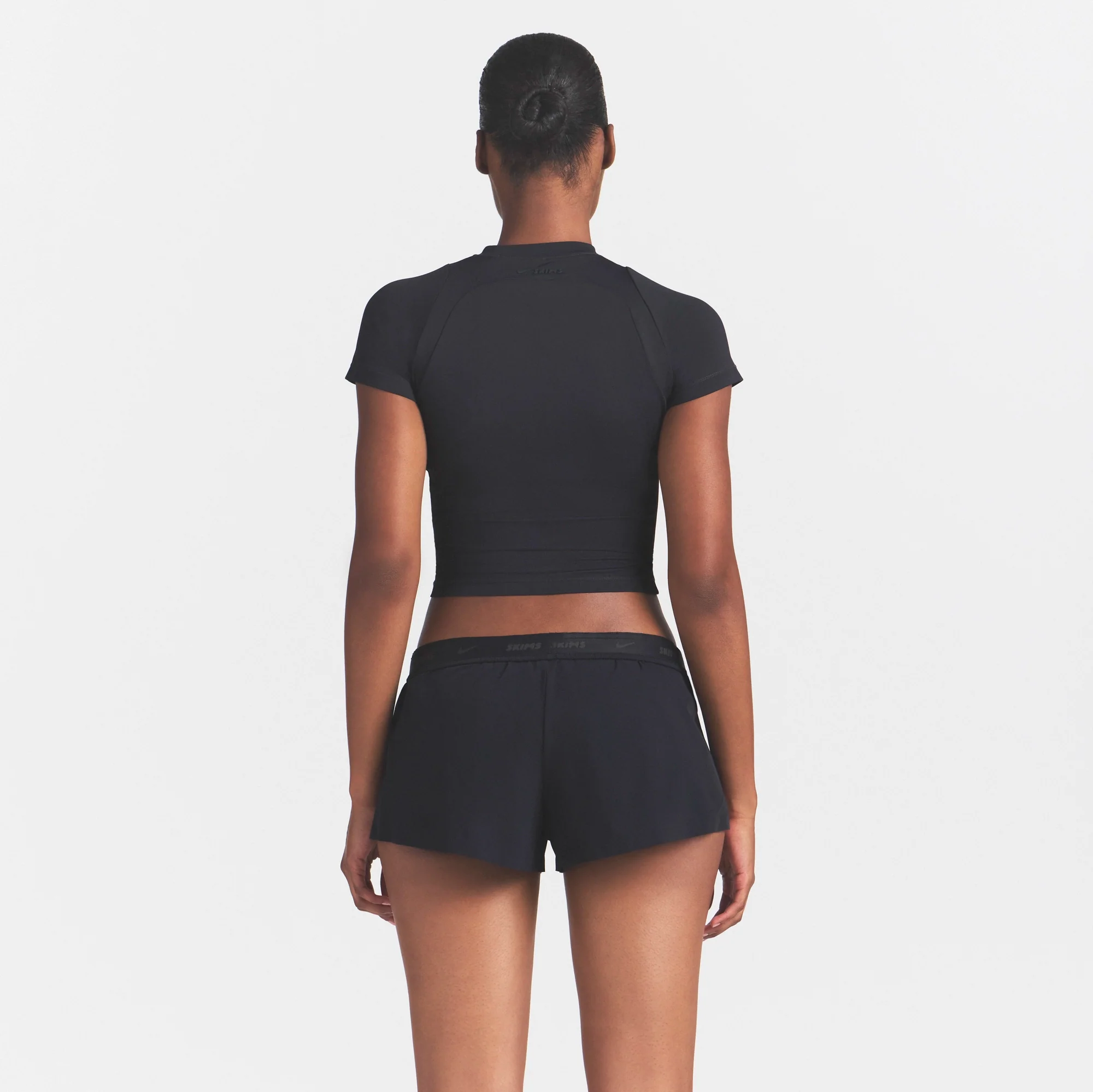 NikeSKIMS STRETCH NYLON RUNNER SHORT | OBSIDIAN - Image 4