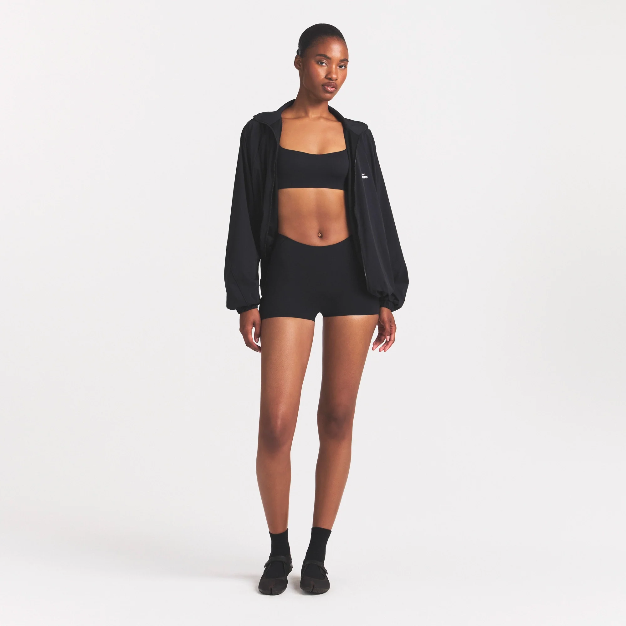 NikeSKIMS STUDIO STRETCH DIPPED 2" SHORT | OBSIDIAN - Image 2