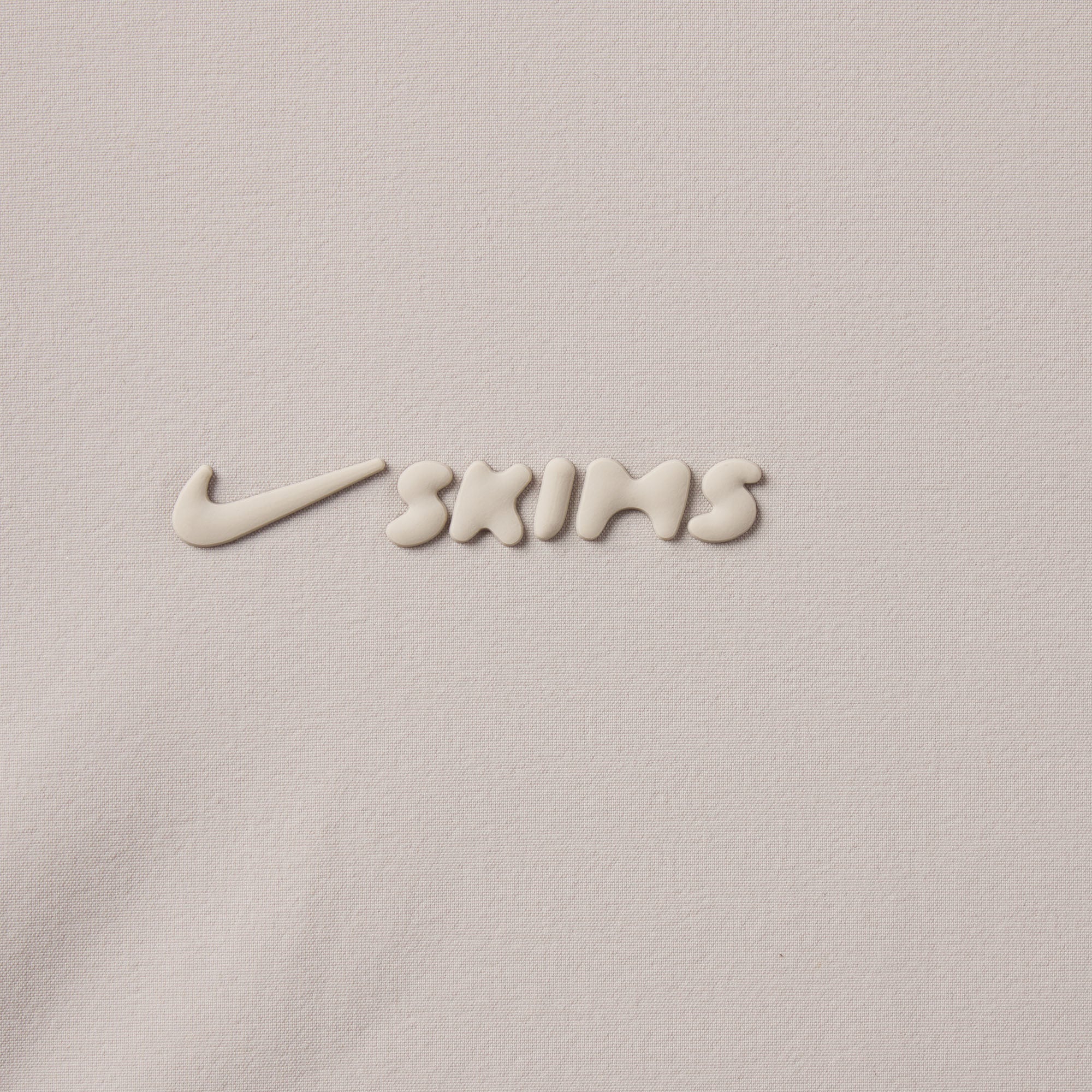 NikeSKIMS WOVEN NYLON 2.5" RUNNER SHORT | STONE - Image 6