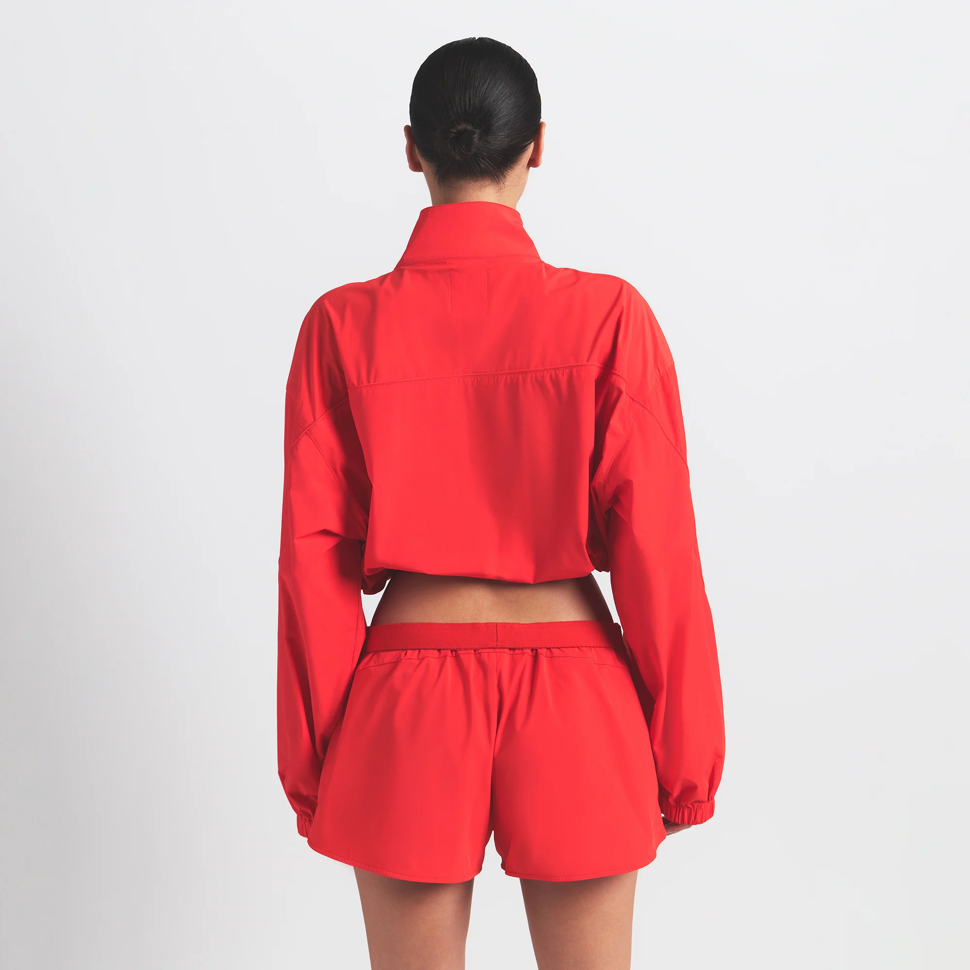 NikeSKIMS WOVEN NYLON CROP JACKET | RUBY - Image 4