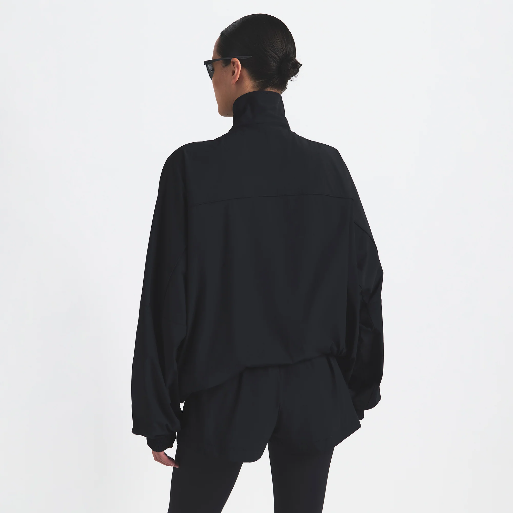 NikeSKIMS WOVEN NYLON OVERSIZED TRACK JACKET | OBSIDIAN - Image 4