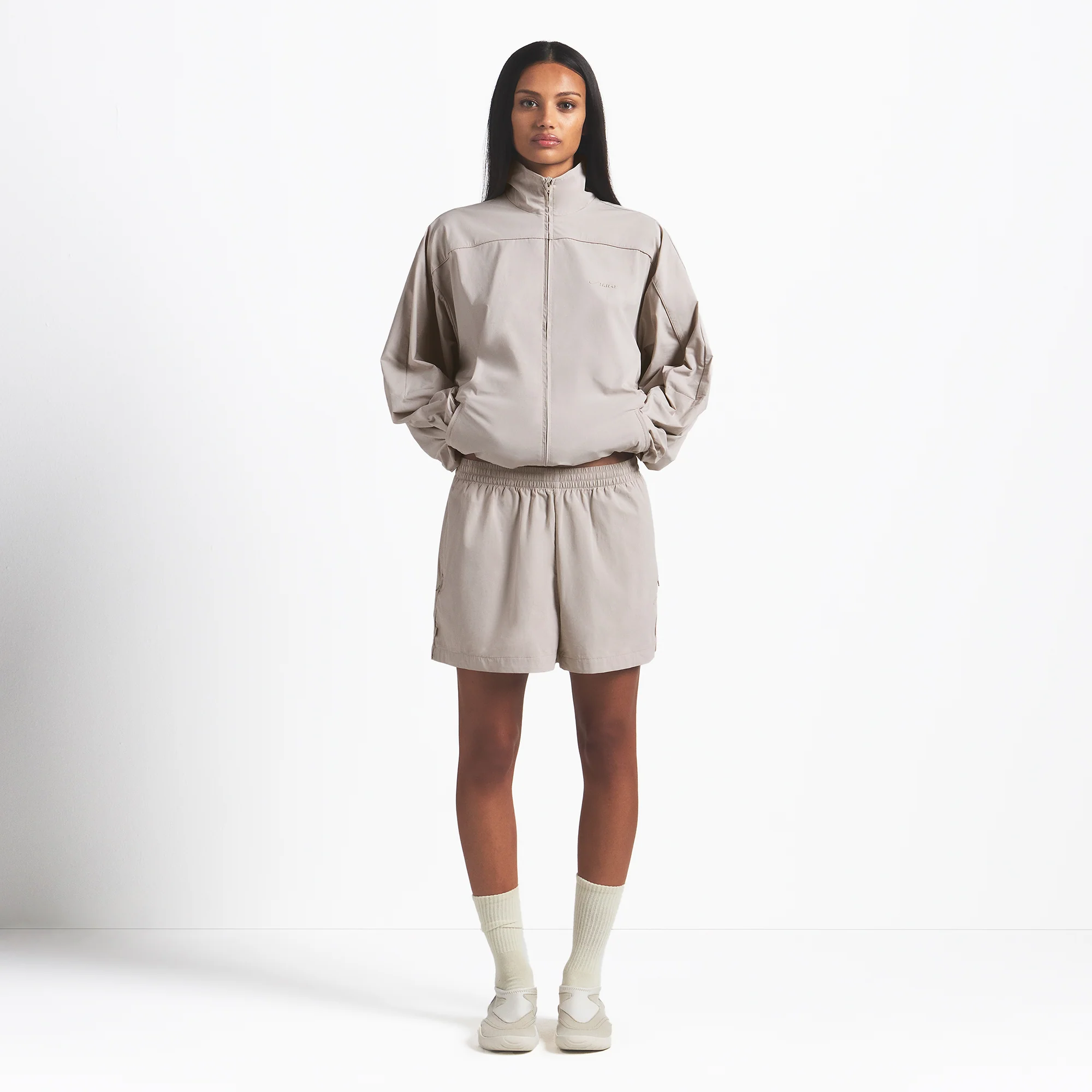 NikeSKIMS WOVEN NYLON OVERSIZED TRACK JACKET | STONE - Image 2