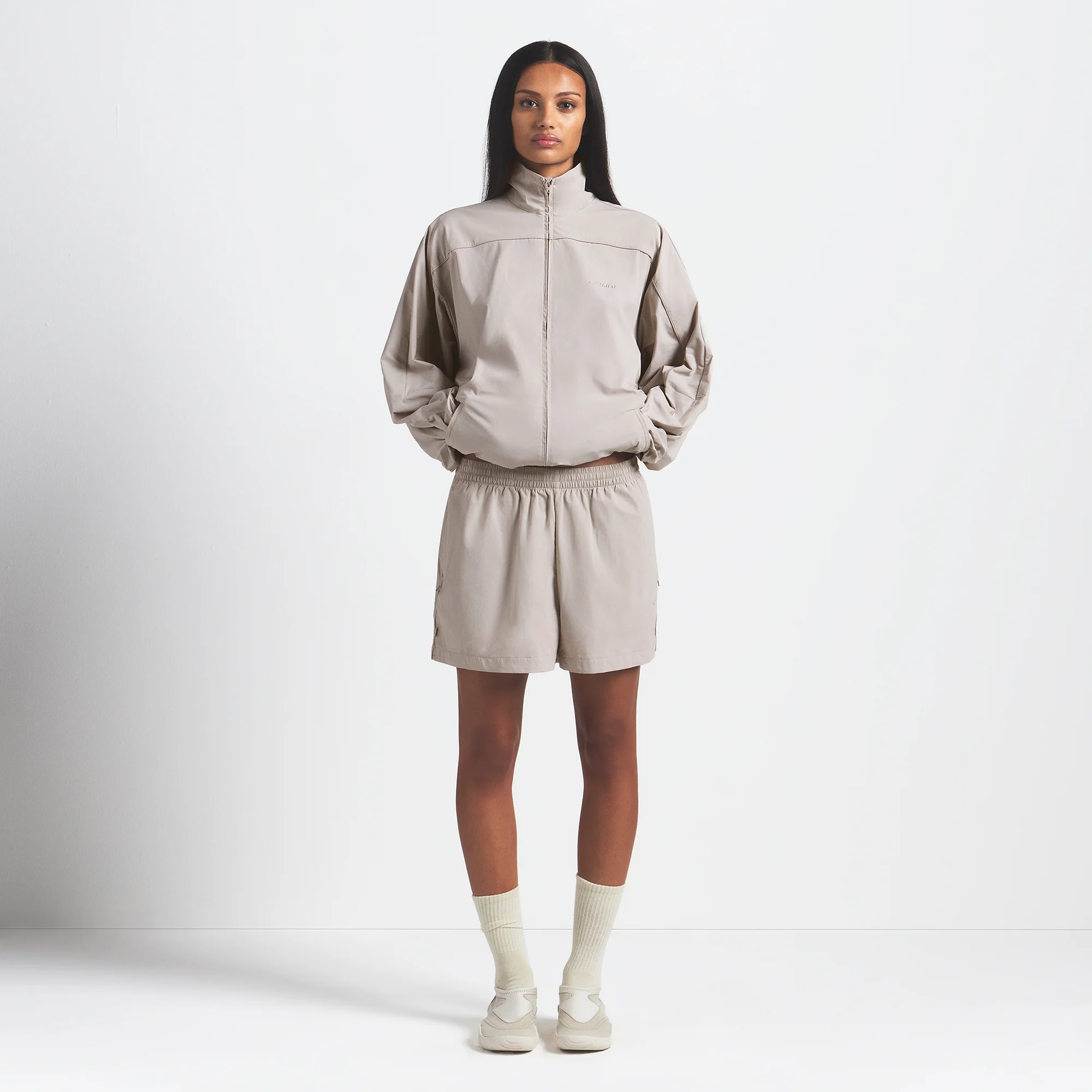 NikeSKIMS WOVEN NYLON OVERSIZED TRACK JACKET | STONE - Image 4
