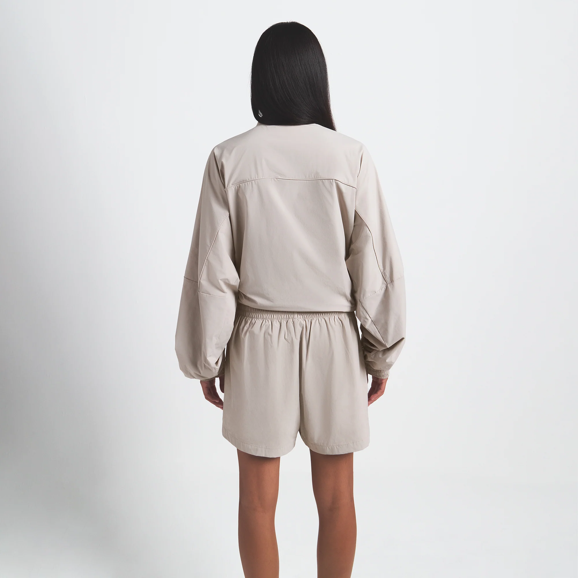 NikeSKIMS WOVEN NYLON OVERSIZED TRACK JACKET | STONE - Image 5