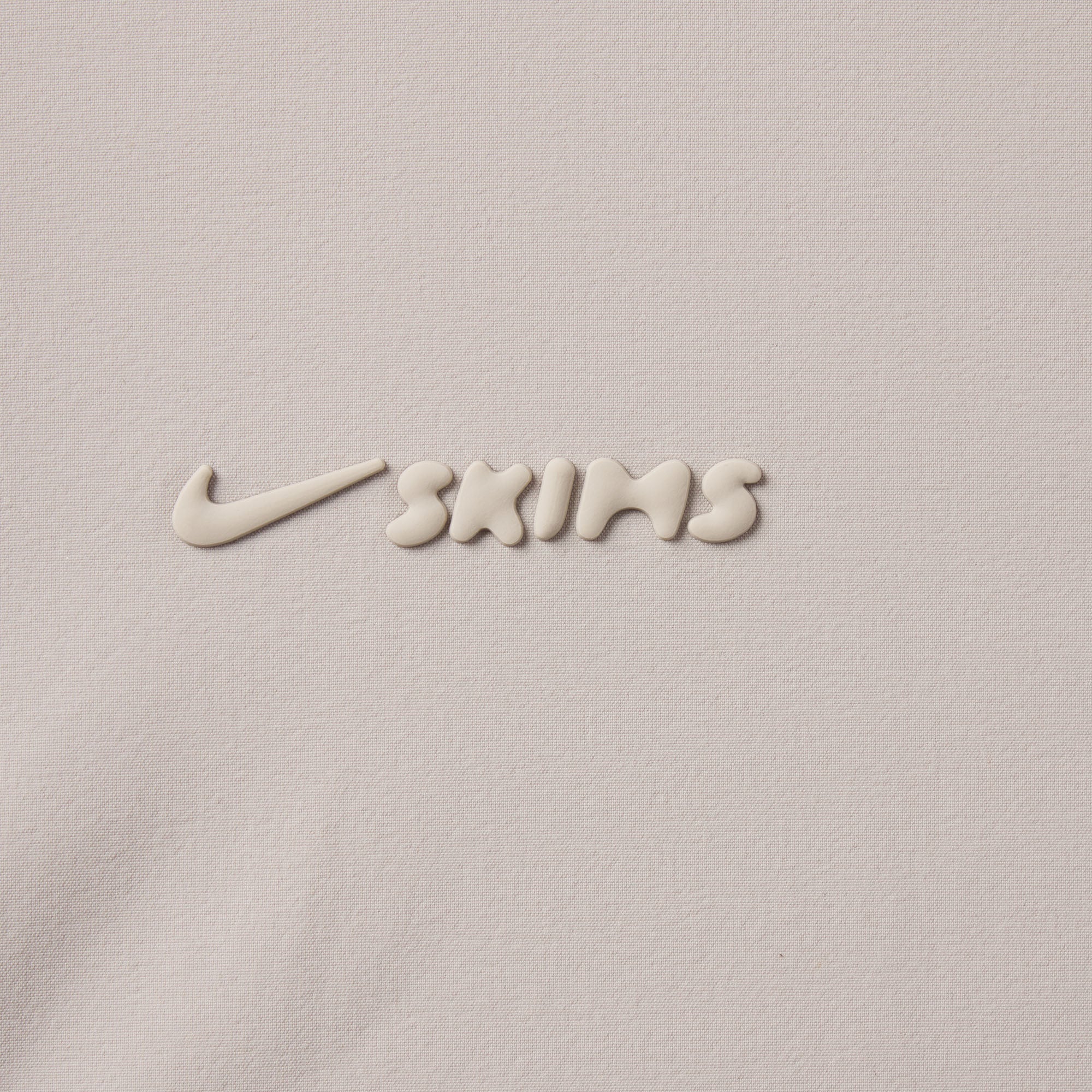 NikeSKIMS WOVEN NYLON 5" TRACK SHORT | STONE - Image 6