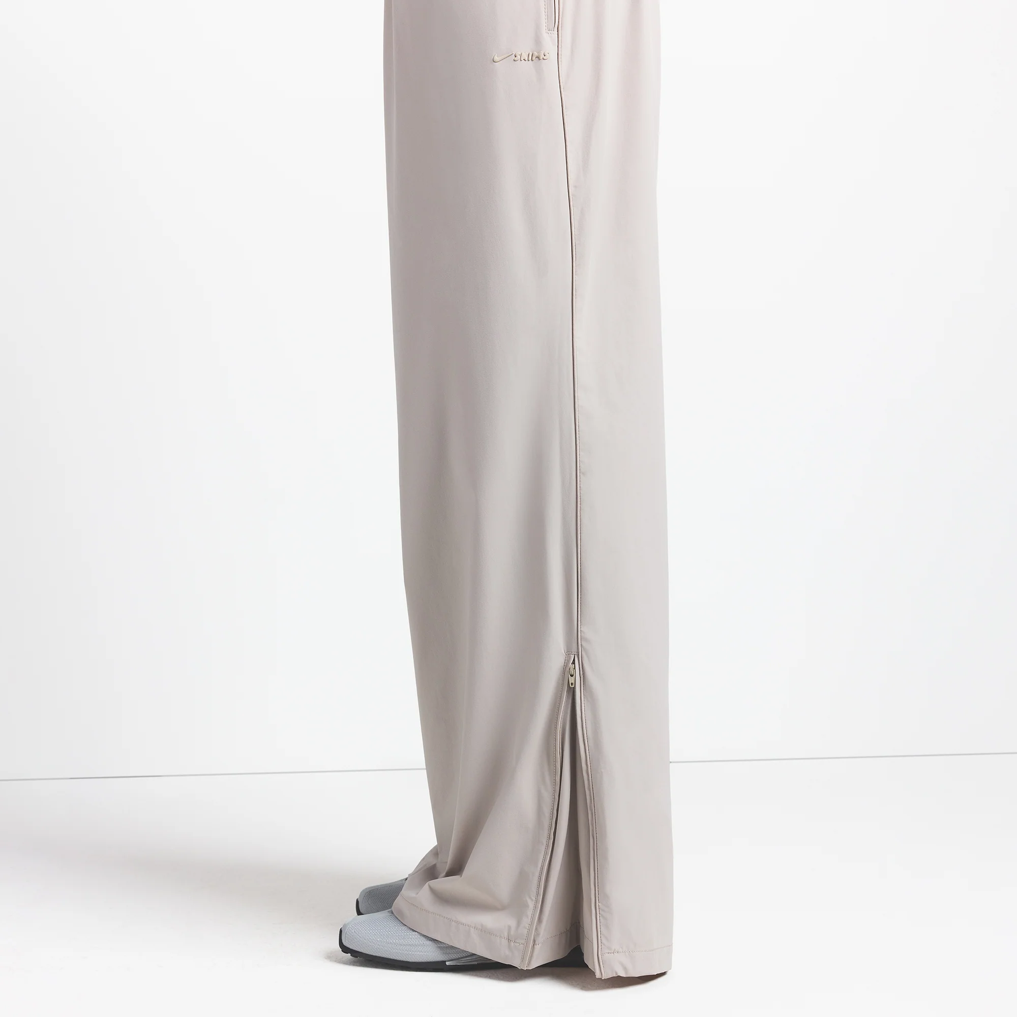 NikeSKIMS WOVEN NYLON OVERSIZED TRACK PANT | STONE - Image 4