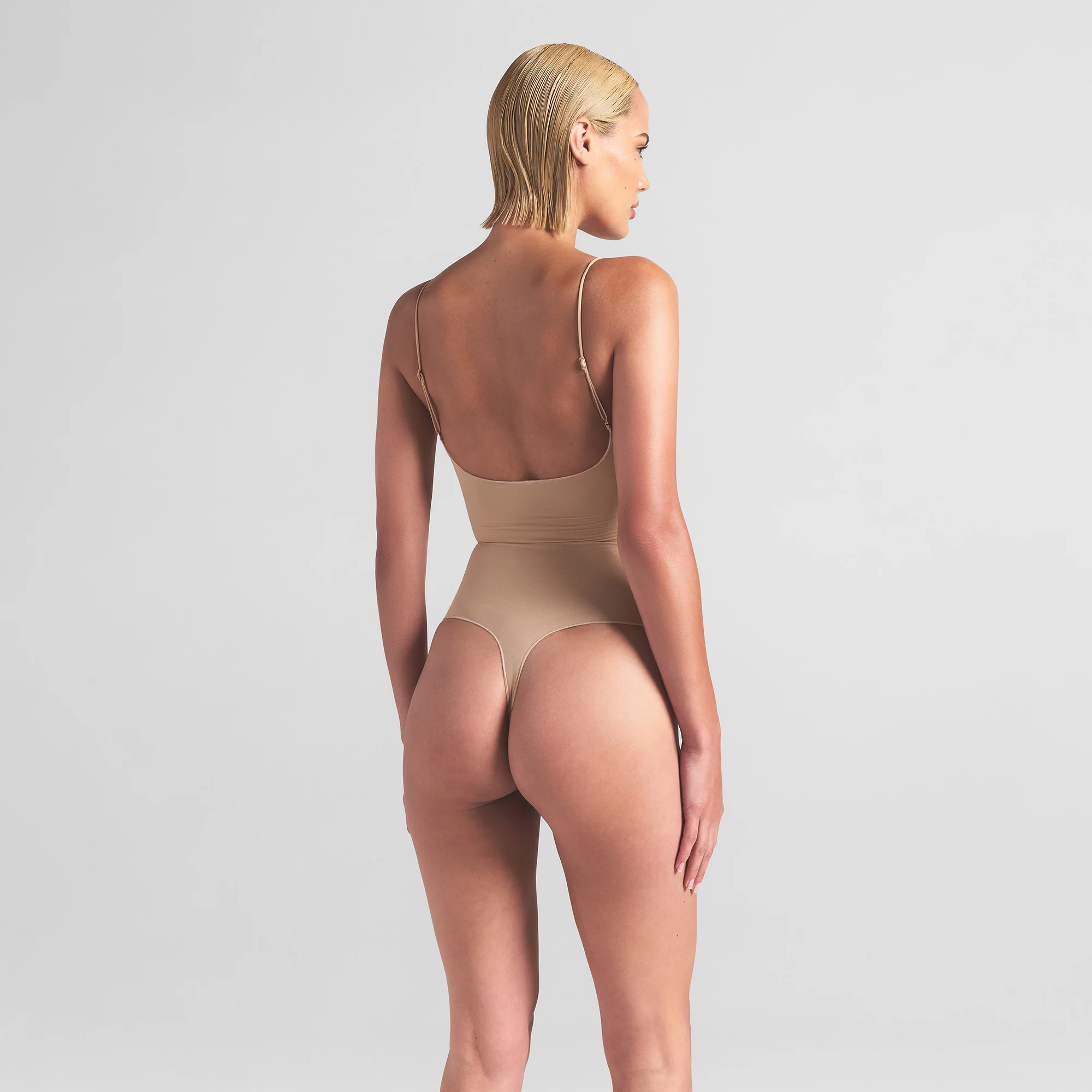 SHEER SEAMLESS THONG BODYSUIT | SAND - Image 5