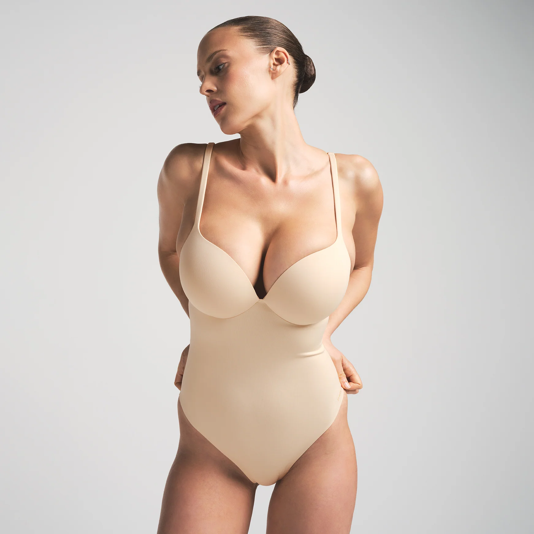 SKIMS ULTIMATE BODY PUSH-UP THONG BODYSUIT | SAND - Image 3